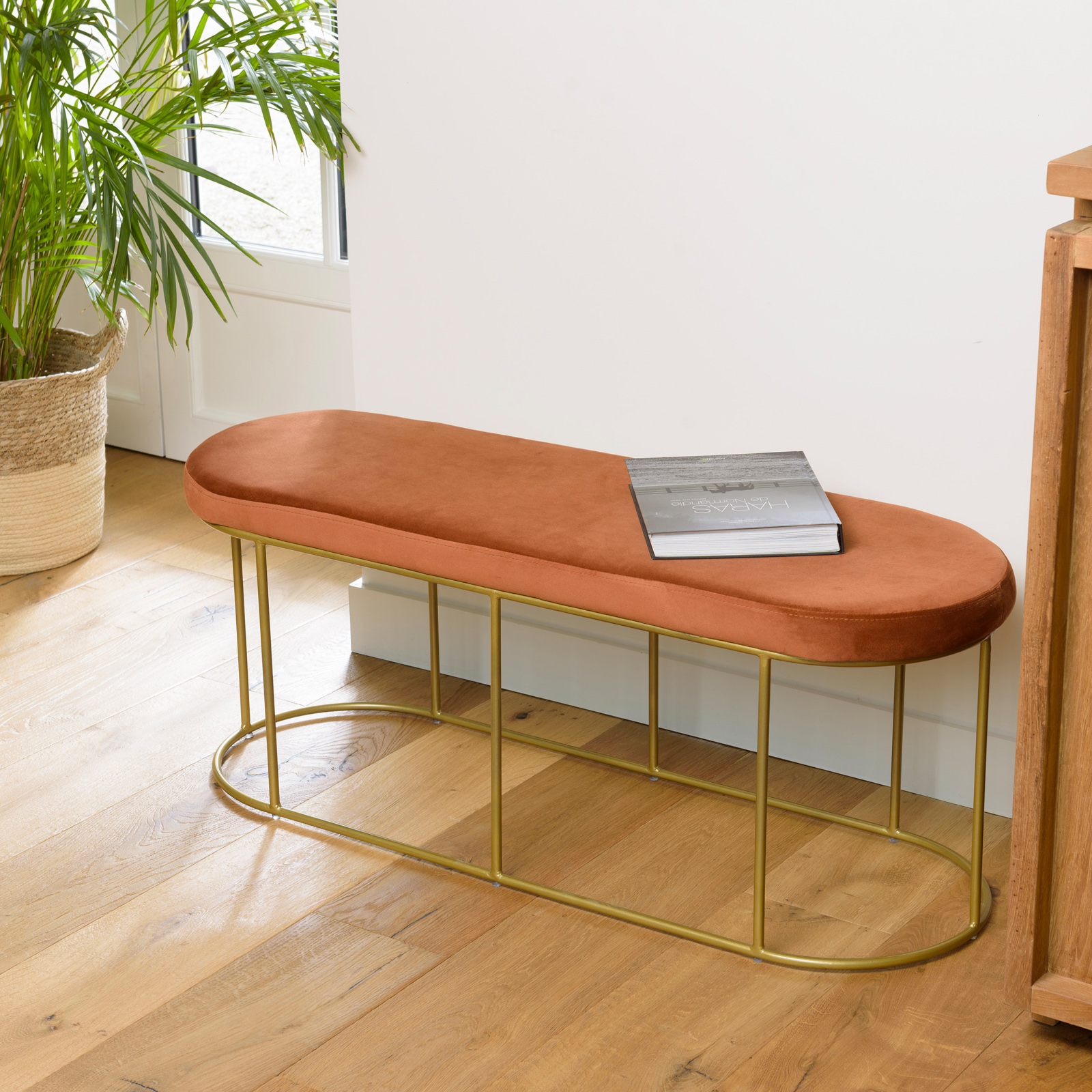 Banquette en velours rouille forme ovale TIM